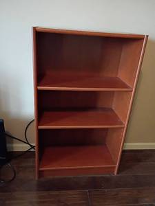 lot 932 image: Bookcase.  41 x 25 x 11.   Located in Basement with Walkout