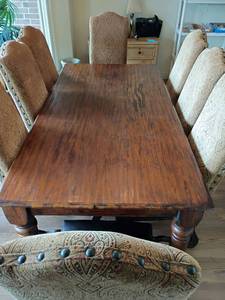 lot 939 image: Dining Room Table with 8 Chairs.   Table 30 x 84 x 42. Chairs are leather and upholstery.  48 x 21 x 22