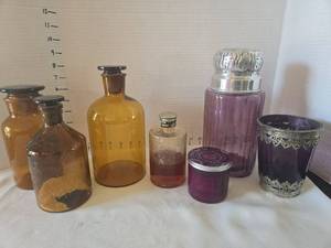 lot 1057 image: Empty bath salts bottles and more