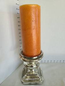 lot 1079 image: Glass Candle Holder with Orange Pillar Candle, 16in tall