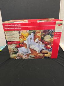lot 1210 image: Paderno Plastic Turning Slicer Vegetable Cutter