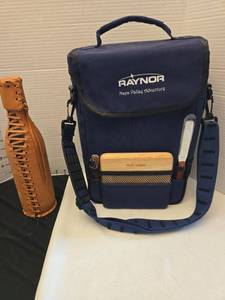 lot 1229 image: Raynor Napa Valley Adventure Wine Bag with Ron Centenario Leather Bottle Cover