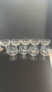 lot 1261 image: Waterford Crystal champagne glasses set of 5 and Crystal brandy snifters set of 4