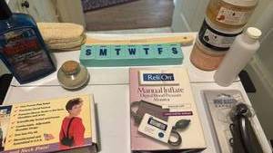 lot 1452 image: Blood pressure cuff, body scrubs, and more