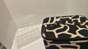 lot 1459 image: Nail polish display and makeup cases