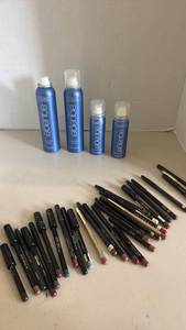 lot 1506 image: Julie Hewett and other testers lip liners and aquage hair spray