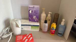 lot 1514 image: Conair heated electric lotion dispenser, lotion, face cleaner and more