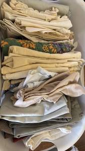 lot 1558 image: Laundry basket with pillow cases one handle is broken