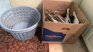 lot 1615 image: Laundry basket and hangers