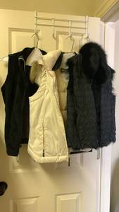 lot 1645 image: Ladies winter vests Small