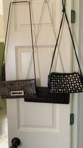 lot 1695 image: Ladies evening bags with one casual bag with broken zipper that looks repairable
