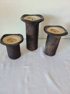 lot 1722 image: Set of Three Rustic Ceramic Candle Holders