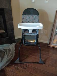 lot 2003 image: Cosco Portable Highchair