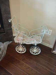 lot 2004 image: Wrought Iron Baby Doll Buggy.  Very cute  Located in Basement