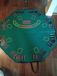 lot 2012 image: Octagonal Casino Blackjack Table Top with Carrying Case.  48 x 48.  Located in Basement with Walkout