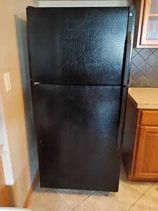 lot 2017 image: GE Refrigerator.  65 x 30 x 32.   Located in Basement with Walkout.  Needs cleaned