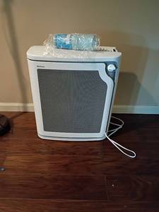 lot 2027 image: Another Holmes Air Cleaner with Extra Filter.  Located in Basement
