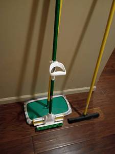 lot 2029 image: Libman Mop, O Cedar Dust Mop and a Silicone Rug Broom.  Located in Basement