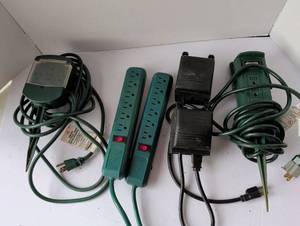 lot 3022 image: Green Christmas Light Set with Intermatic Timer and Power Strips, and box of white lights