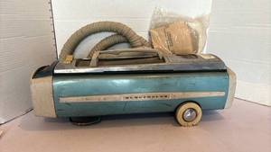 lot 3109 image: Vintage Electrolux Canister Vacuum Cleaner with Attachments