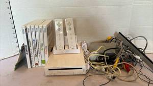 lot 3139 image: Nintendo Wii Gaming Console Bundle with Controllers and Games