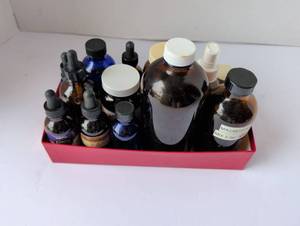 lot 3300 image: Glass jar and dropper Bottle Collection