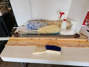 lot 3604 image: Yardsticks, curtain rod, dusting wands, spray bottles.