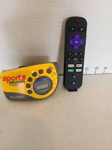 lot 3618 image: Sony Walkman Sports Radio and Roku Streaming Remote Bundle