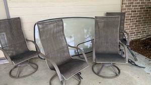 lot 4020 image: Outdoor Patio Dining Set with Glass Table Chairs - base may need to be replaced  - table is 68X40 and chairs are 44 X24X18