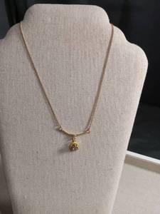 lot 5994 image: Gold Chain Necklace with Rose Pendant and Crystal Center