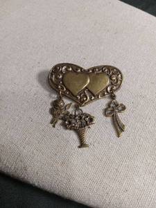 lot 50275 image: Heart Shaped Brooch with Dangling Charms