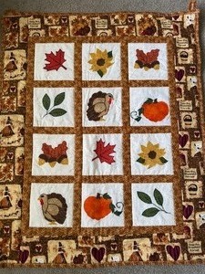 lot 73 image: Quilted Autumn Themed Wall Hanging