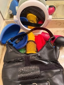 lot 103 image: Mirror, Blow Dryer and More in a Rolling Travel Bag