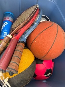 lot 410 image: Blue Tote (21 Gal) Filled w Balls, Raquets, Pool Float