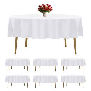 lot 5099 image: 6 Pack White Round Tablecloths 70 Inches Table Cloth Stain and Wrinkle Resistant Washable Polyester Table Cover Fabric for Party, Wedding,Dining,and Banquet Decoration - Retail $40