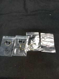 lot 5239 image: Pack of 4 Gold Bands  Size 6&nbsp