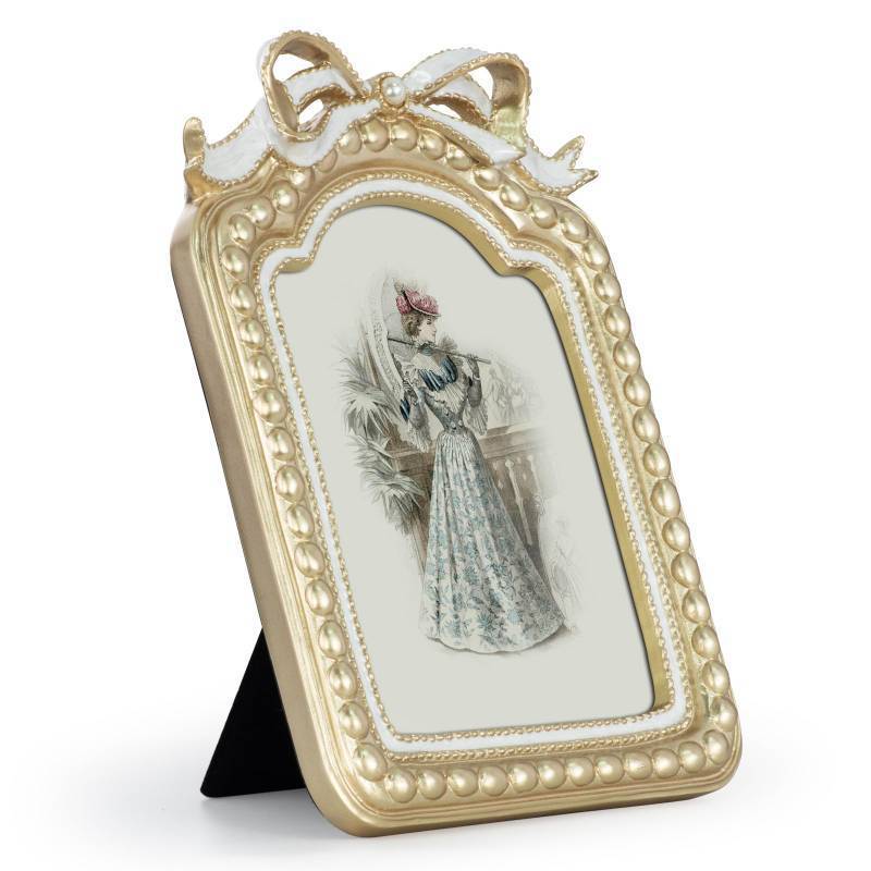 lot 3702 image: GUOER Vintage 5x7 Picture Frame with Bow Antique Ornate Table Top and Wall Mounting Photo Frame with High Definition Glass Front for Home Decor, Photo Gallery, Art(5x7, Gold) - Retail $23