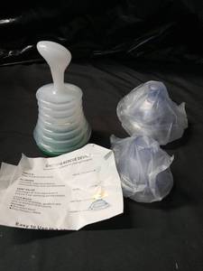 lot 5493 image: Choking Rescue Device with Adult and Pediatric Masks - Retail $15