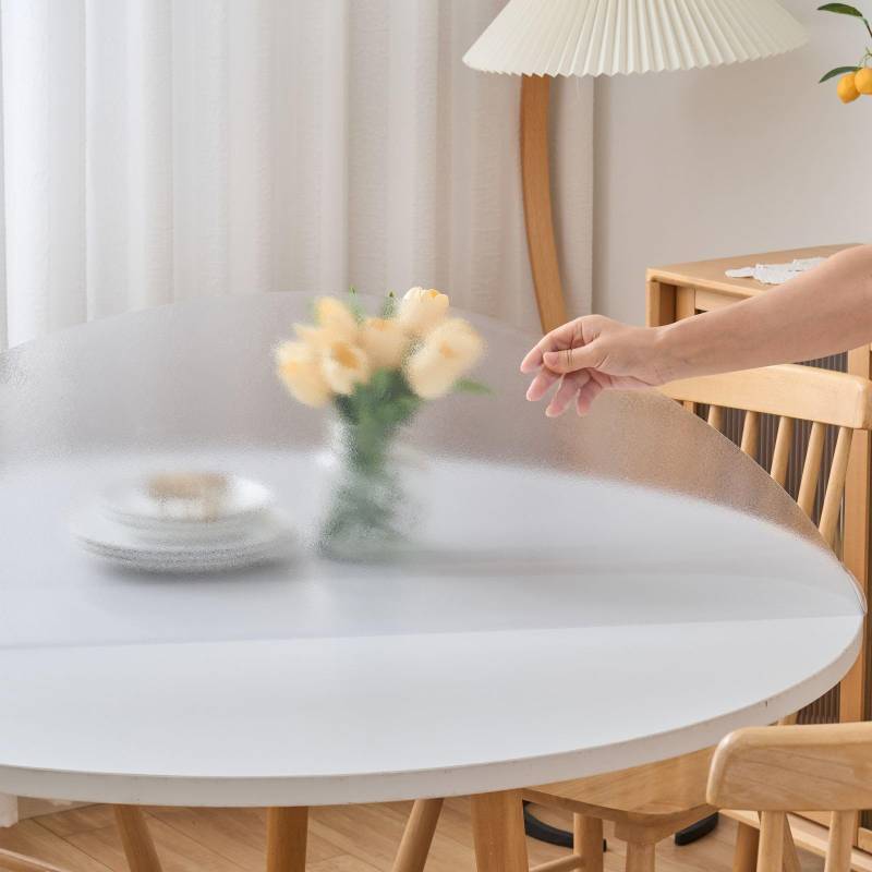 lot 1288 image: Eisdroma 48 Inch Round Frosted Table Cover Protector, Frosted Round Table Protector for Dining Room Table, 1.5mm Thick Waterproof Round Plastic Vinyl Pad - Retail $35