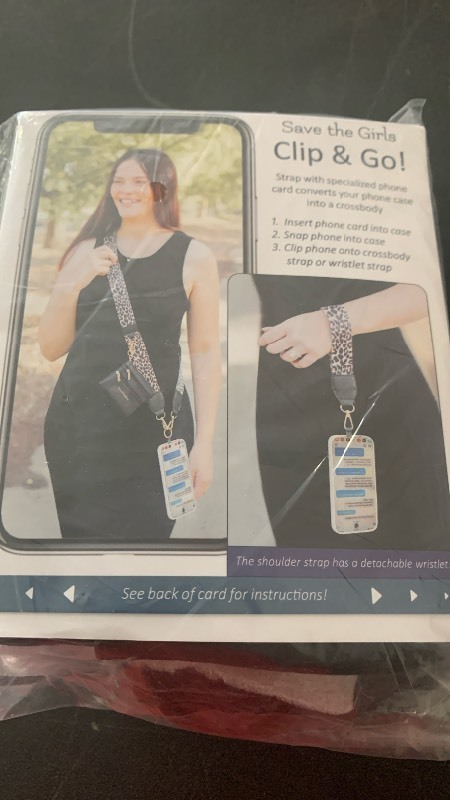 lot 126 image: Save the Girls Clip & Go Phone Wristlet with Matching Strap - Black