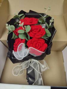 lot 354 image: Handmade Crochet Red Rose Bouquet with Black Wrapping