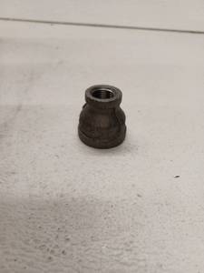 lot 67686 image: Jones Stephens 1 x 12 Red Coupling Iron Fitting