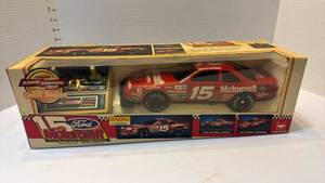 lot 1001 image: Vintage radio controlled Ford Motorcraft Thunderbird model car in original box