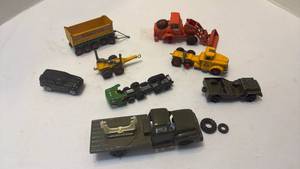 lot 1015 image: Miniature trucks, farm implements and Army vehicle