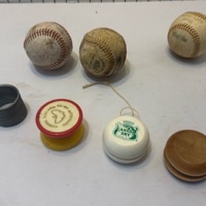 lot 1026 image: Baseballs, yo yo and slinky