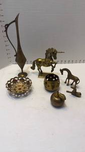 lot 1031 image: Brass vessel, candle holder, giraffes and unicorn