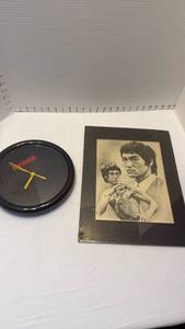 lot 1035 image: Bruce Lee matted print and Ryder clock
