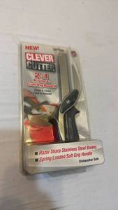 lot 1063 image: Clever Cutter 2 in 1 knife and cutting board new in pkg