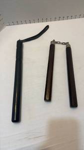 lot 1071 image: Nunchucks and baton