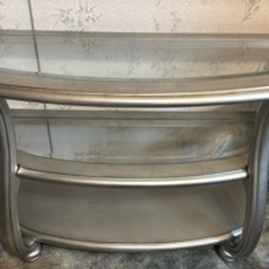 lot 1087 image: Sofa table with 2 beveled glass  matches lot 1088shelves with a silver finish 30x47x19